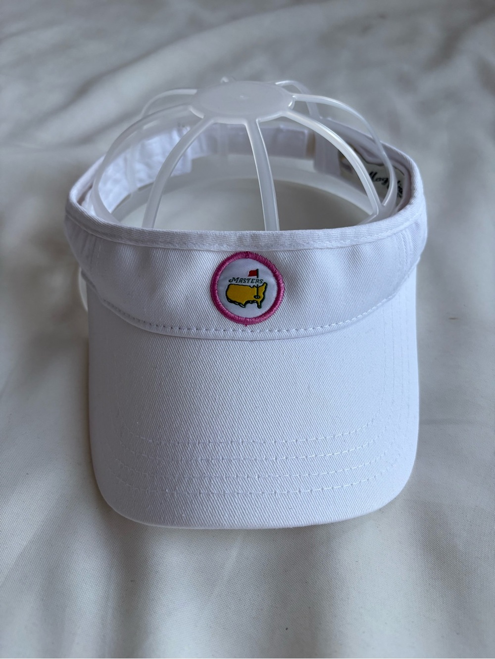 Masters ladies white visor with pink accents Magnolia lane